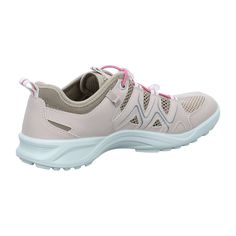 a woman's white shoe with pink laces