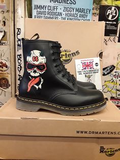 Rare pair of Dr Martens 1460 in Black with 'Crazy Skull' Design. Classic Dr Martens 8 Hole with Unique Artistic Design, Iconic Yellow Stitching and Famous Dr Martens Air Cushioned Sole. Available in Sizes UK 5 and 6  £220 Skull Boots, Dr Martens White, Green Boots, Patent Leather Boots, Cream Shoes, White Boots, Navy Leather, Skull Design, Dr. Martens Boots