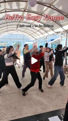 a group of young people dancing under a tent with the words retro easy dance on it