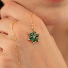 Introducing our stunning Birthstone Flower Necklace, which perfectly combines the beauty of nature with personal significance. This elegant piece features a delicate flower pendant, each petal adorned with a vibrant birthstone of your choice, representing special people or moments in your life. It combines elegance with durability, ensuring that it remains a valuable piece for years to come. The intricate design captures the essence of a blooming flower, symbolizing growth, love and renewal. Each birthstone is hand-selected for its brilliance and color, creating a stunning array of hues that sparkle with every movement. This Birthstone Flower Necklace is more than just a piece of jewelry; This is a personalized keepsake that celebrates the unique bond between you and your loved ones. Wheth Nature-inspired Flower Gemstone Jewelry, Elegant Flower Jewelry For May Birthstone, Flower Shaped Jewelry With Natural Stones For Gift, Flower Shaped Natural Stones Jewelry For Gift, Flower Shaped Natural Stones Jewelry Gift, Elegant Green Pendant Flower Necklace, Elegant Flower Pendant Necklace With Birthstone, Elegant May Birthstone Necklace With Flower Shape, Elegant May Birthstone Necklace In Flower Shape