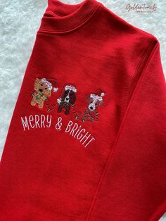 "EMBROIDERED TODDLER CHRISTMAS SHIRT WITH DOG TRIO Red, long-sleeve crewneck sweatshirt, embroidered with trio of dogs and \"Merry and Bright\" text, toddler/unisex sizing, 100% cotton No detail is spared, as I embroider every item myself. RETURNS & EXCHANGES: Due to the custom nature of this item, returns are not accepted. If you are unhappy with your order, please reach out to me and we can work together to find a resolution. Thank you for visiting Golden Touch Embroidery! Should you have any Red Embroidered Holiday Tops, Red Cotton Christmas Sweatshirt, Kids Christmas Shirt, Toddler Christmas Shirt, Christmas Shirts For Kids, Embroidery Sweater, Dog Sweatshirt, Embroidery Sweatshirt, Toddler Christmas