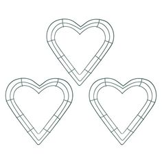 three heart shaped frames are shown in black and white