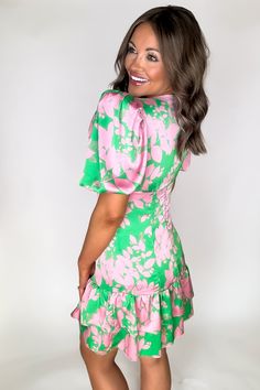 Unleash your inner flower power with this dress! Made of silky sating material, the statement puff sleeves add a whimsical touch to any outfit. Feel like a walking work of art in this vibrant floral green printed dress. Fit: She is wearing her true size medium. Fits true to size. If in between sizes, size up. Green Puff Sleeve Mini Dress For Summer, Green Puff Sleeve Mini Dress For Brunch, Green Floral Mini Dress With Ruffles, Green Mini Length Puff Sleeve Dress For Brunch, Green Short Sleeve Dress For Brunch, Fitted Green Puff Sleeve Dress With Floral Print, Green Fitted Puff Sleeve Dress For Garden Party, Fitted Green Puff Sleeve Dress For Garden Party, Printed Green Knee-length Mini Dress