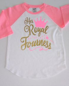 a pink and white shirt that says ker royal tournes with a gold crown on it