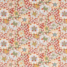 an orange and white flowered background with lots of green, red and yellow flowers