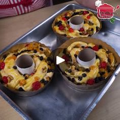 three cakes sitting on top of a metal pan