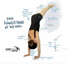 a woman is doing a handstand on the wall