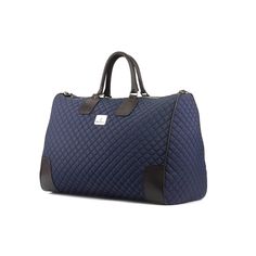 This is the bag you need for your quick weekend getaway. Durable, stylish, and the perfect size for a quick trip. THE DETAILS: Materials: Quilted dark blue fabric + Black Box Calf Italian Leather Lining: Beige fabric Dimensions: 18.89 x 13.38 × 9.84 inches / 48 x 34 × 25 cm (width x height × depth) Laser Engraving: Available by request to add up to two short lines of name or wording engraved on an exterior leather patch for an additional charge. THE FINE PRINT: Production timeline/shipping can v Blue Shoulder Bag For Travel With Dust Bag, Luxury Large Capacity Blue Satchel, Designer Navy Bags For Daily Use, Designer Weekender Bag With Large Capacity For Travel, Designer Large Capacity Weekender Bag For Travel, Designer Bags With Leather Trim For Weekend Trips, Luxury Bags With Leather Trim For Overnight Trips, Luxury Blue Rectangular Duffle Bag, Luxury Navy Tote Shoulder Bag