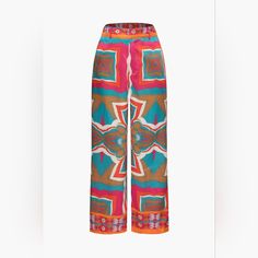 These Printed High-Waisted Wide Leg Trousers Offer A Bold And Eclectic Style. The Vibrant Patterns Create A Statement Piece, While The High-Waisted Cut Accentuates The Waist For A Flattering Silhouette. The Wide Legs Provide A Flowy And Comfortable Feel, Making Them A Versatile Choice For Both Casual And More Polished Looks. Pair Them With A Tucked-In Blouse Or A Fitted Top To Highlight The Unique Print And Silhouette. High-waisted Elastane Wide Leg Pants For Summer, Summer Wide Leg Elastane Pants, Chic Multicolor Wide Leg Pants With Elastic Waistband, Blue Elastane Pants For Summer, Blue Elastane Summer Pants, Multicolor High-waisted Wide Leg Pants With Elastic Waistband, Casual Multicolor Print Bottoms, Chic Multicolor High Waist Wide Leg Pants, Chic Multicolor High-waist Wide Leg Pants