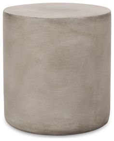 a round concrete table sitting on top of a white floor