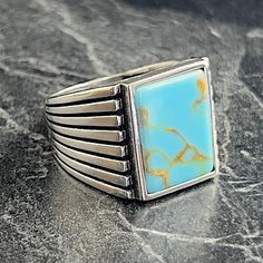 Handmade Square Turquoise Gemstone Silver Ring , Geometric Style Design Ring , Natural Blue Turquoise Ring , Men Vintage Ring , Gift For Him , Same Day For Shipping ✧ Product Details * Handmade İtem * Gender : Male / Female * Material : 925K Sterling Silver * Ring Weight : 11.5 Grams * Gemstone Type : Turquoise ✔ Usage Details * Silver jewelry is very sensitive to chemicals. It is recommended to keep away from chemical substances such as cream, bleach, deodorant, detergent. * Silver jewelry can Modern Blue Rings With Large Stone, Handmade Turquoise Rectangular Rings, Modern Blue Turquoise Gemstone Ring, Unique Rectangular Turquoise Ring, Modern Turquoise Ring As Gift, Modern Turquoise Ring For Gift, Modern Turquoise Ring For A Gift, Rectangular Blue Turquoise Gemstone Ring, Handmade Rectangular Blue Ring