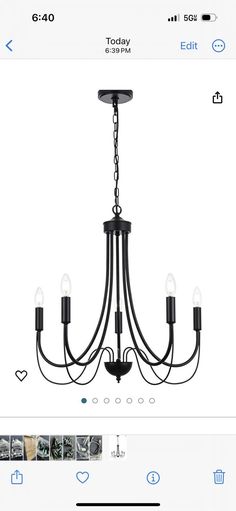 a black chandelier with five lights hanging from it's center and the bottom