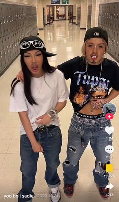 two young women standing next to each other in a hallway with lots of lockers