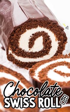 chocolate swiss roll with white frosting on top