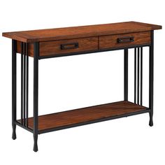 a wooden table with two drawers on one side and an iron frame shelf on the other