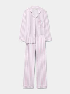 For the most luxurious night’s sleep, the Long Pyjama Set in Pale Pink Stripe print is the ultimate choice. Elevating every night-time ritual, slow Sunday morning and indulgent lazy day, this is comfort like no other. Made from 95% biodegradable TENCEL™ Modal x Micro (AKA trees!). Proven to be more than twice as soft as cotton. Cloud-soft, breathable, feminine & comfortable. Sustainable nightwear designed by women, for women. One tree planted with every order. Model wears a size M. Mainline - 95% TENCEL™ Modal, 5% Elastane. Lace: 91% Nylon, 9% Elastane. B-Edit - 74% TENCEL™ Modal, 19% SeaCell™ and 10% Roica V550. Soft Brushed Woven - 100% EcoVero Viscose from Lenzing. We recommend washing on a cool, 30 degree wash or by hand. Dry flat and avoid tumble drying. Thrift Wishlist, Lulu Outfits, Striped Pajamas, Slow Sunday, Striped Pyjamas, Cap Fashion, Lazy Day, One Tree, Pyjama Set