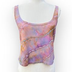 "Hand-Dyed Soft Pink Opal Geode Tie Dye Crop Tank Top This one-of-a-kind tank top has been hand-tied & ice-dyed to create a colorful geode pattern. It was dyed using professional fiber reactive Procion fabric dyes. Machine washable and ready to wear. Perfect for festival season, lounging around the house or night out on the town.  Item Details: - Old Navy Brand Tank Top - Women's Size 2X - Fitted Cropped Top - 92% Cotton, 8% Spandex Ribbed Knit - Prewashed and Preshrunk - Chest: 36\" Unstretched - Total Length: 19\" The item in photos is the item that you will receive. Please note that color may vary slightly based on your monitor settings. Please see my other listings for other one-of-a-kind tie dyes." Spring Acid Wash Sleeveless Tops, Multicolor Hand Dyed Sleeveless Tops, Hand Dyed Multicolor Sleeveless Tops, Multicolor Hand-dyed Sleeveless Top, Hand Dyed Sleeveless Top For Spring, Hand Dyed Acid Wash Sleeveless Top, Acid Wash Hand Dyed Sleeveless Top, Acid Wash Hand-dyed Sleeveless Top, Hand Dyed Sleeveless Tank Top For Spring