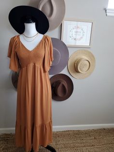 Smocked Flutter Sleeve Midi Dress – Mota Boutique Casual Flutter Sleeve Midi Dress For Brunch, Casual Flowy Empire Waist Maxi Dress, Casual Midi Dress With Flutter Sleeves For Brunch, Casual Midi Dress With Smocked Bodice And Flutter Sleeves, Casual Midi Dress With Smocked Back And Ruffle Sleeve, Casual Flowy Dress With Butterfly Sleeves, Casual Summer Maxi Dress With Elastic Sleeves, Chic Flowy Smocked Dress For Brunch, Vacation Midi Dress With Smocked Bodice And Flutter Sleeve