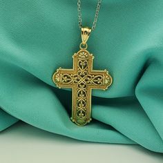 This vintage cross is like having two pieces in one! One side is made of very detailed 14k yellow gold, while the other side is both whit and yellow gold filigree.  An adjustable sterling silver chain (18", 16", 14") is included so this piece really will work with any outfit. The cross is a substantial 1.25" long and .75" wide.  It is 3mm thick and has a textured, 3-dimensional look to it.  Including the yellow gold bail, it hangs about 1.5" long. Gold Filigree, Religious Jewelry, Fine Jewellery Necklace, Sterling Silver Chain, Sterling Silver Chains, Silver Chain, Cross Necklace, Jewelry Necklace Pendant, Two Tone