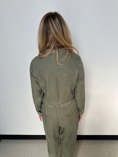 Utility inspired tencel, belted, paint splatter jumpsuit with long sleeves and a button down front. Fabric Contents 100% Tencel Trendy Belted Jumpsuit For Fall, Casual Long Sleeve Belted Jumpsuits And Rompers, Trendy Belted Jumpsuits And Rompers For Fall, Spring Long Sleeve Utility Jumpsuits And Rompers, Utility Long Sleeve Jumpsuits And Rompers For Spring, Spring Utility Long Sleeve Jumpsuits And Rompers, Spring Utility Jumpsuits And Rompers With Long Sleeves, Utility Style Belted Jumpsuit For Fall, Jumpsuit With Long Sleeves