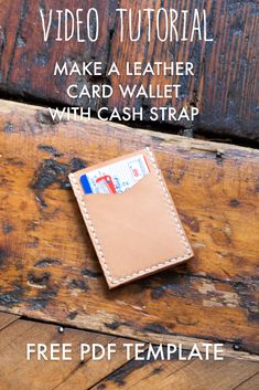 a leather wallet sitting on top of a wooden table