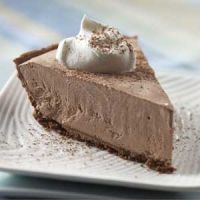 a piece of chocolate cake sitting on top of a white plate