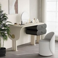 a white desk with a mirror and stool next to a potted plant in front of it