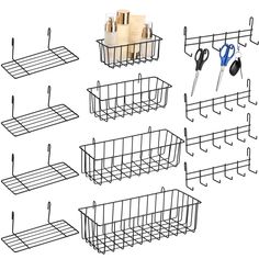 several wire baskets with scissors and other items in them on a white surface next to each other