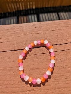 This bracelet is perfect for the summertime or as a gift.  If you love colorful bracelets/Jewelry, then you should check out more creations from my shop! Colorful Round Beads Bracelets For Vacation, Orange Beaded Bracelets With Heart Beads As Gift, Orange Heart Beads Beaded Bracelet For Gift, Orange Heart Beads Beaded Bracelet As Gift, Orange Beaded Bracelet With Heart Beads As Gift, Spiritual Pink Round Beads Friendship Bracelets, Spiritual Pink Friendship Bracelets With Round Beads, Spiritual Pink Bracelet For Beach, Pink 8mm Beads Jewelry For Beach