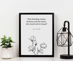 a black and white photo with a quote on it next to a potted plant