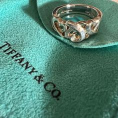 Tiffany & Co. Paloma Picasso Loving Hearts Ring 925 Sterling Silver Bought At Tiffany & Co. In Las Vegas Retired Design Excellent Condition Minor Wear Could Use A Simple Cleaning & Polishing Will Come With Protective Pouch Love Ring Tiffany & Co., Jewelry Tiffany, Paloma Picasso, Tiffany Co Jewelry, Womens Jewelry Rings, Paloma, Tiffany & Co., Heart Ring, Las Vegas