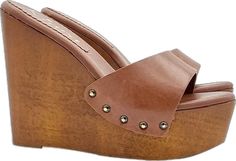 Brown Wooden Sandals, Brown Platform Wedge Heel Mules, Brown Platform Mules For Beach, Summer Brown Wooden Mules, Brown Wooden Mules For Summer, Brown Wood Mules For Summer, Brown Open Toe Wooden Heels, Brown Wood Open Toe Heels, Brown Wedge Sandals With Wooden Heel