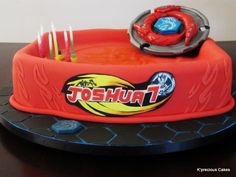 an orange toy boat with toothbrushes in it on top of a black table