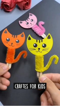 two handmade cats on toothpicks with the words crafts for kids