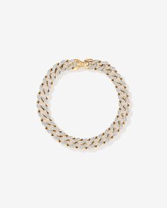 Elevate your jewellery collection with this luxurious 10 karat yellow gold cuban link curb chain bracelet. Featuring 2.00 carat total weight of pave-set, round brilliant diamonds with HI colour and I2 clarity. At 21cm, and 9-9.5mm in width, it secures with a lobster clasp. Cuban Link Bracelet, Curb Chain Bracelet, Wedding Day Jewelry, Engagement Ring Guide, Diamond Bridal Sets, Diamond Shop, Earring Sale, Diamond Set, Cuban Link