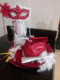 a red hat and mask on a table