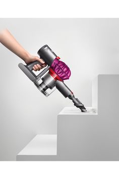 The Dyson V7 Motorhead cord-free vacuum has 75% more brush bar power than the Dyson V6 Cord-Free vacuum. Engineered for all floor types, the Direct-drive cleaner head drives bristles into the carpet to remove even more dirt. The Dyson V7 Motorhead cord-free vacuum quickly transforms to a handheld for quick clean ups, spot cleaning and cleaning difficult places. All Dyson official refurbished machines have been thoroughly tested to meet like-new performance standards. Units may have some cosmetic Cordless Stick Vacuum Cleaner, Hand Vacuum, Roller Brush, Stick Vacuum, Cordless Vacuum, Handheld Vacuum, Quick Cleaning, Hard Floor, Spot Cleaner