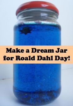 a jar filled with blue liquid and the words make a dream jar for road dahl day