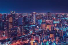 an aerial view of a city at night