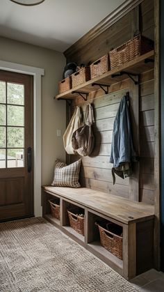 A farmhouse-style mudroom is cozy. Use wood, rustic hooks, and earthy tones. Distressed wood or a barn door can make your mudroom feel welcoming and country. This style is perfect for families looking for a warm, rustic entryway. Mudbench Design, Rustic Mudroom Bench, Farmhouse Entrance Ideas, Country Farmhouse Mudroom, Mudroom Ideas Entryway Rustic, Mudroom Hallway Ideas, Country House Entryway, Rustic Mudroom Ideas, Rustic Mud Room Ideas