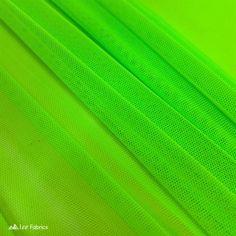 close up view of neon green fabric