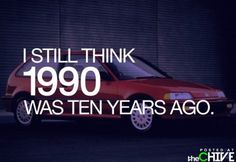 a red car parked in front of a garage door with the words i still think 1900 was ten years ago