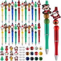 various christmas themed pens and magnets are arranged on a white background, including santa's helpers