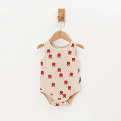 Get your little one stylin' and comfortable in our Organic Cotton Baby Onesie! Made with 100% organic cotton, this onesie is perfect for hot summer days. With 3 different prints to choose from, your baby will be the coolest on the block. Summer Cotton Onesie With Floral Print, Cute Spring Cotton Bodysuit, Spring Cotton Bodysuit For Playtime, Spring Playtime Cotton Bodysuit, Cute Floral Print Onesie For Summer, Summer Cotton Onesie For Playwear, Playful Cotton Onesie With Floral Print, Summer Cotton Bodysuit For Playwear, Summer Cotton Playwear Onesie