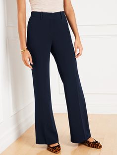 Tailored charm meets on-trend . Our fashion-forward flare leg pants are perfect for work and travel. Easy-to-pack, easy care. Simple elegance in lightweight, wrinkle-resistant fabric and a sophisticated fit. Features Flat Front/Trouser Flare Leg Hits High Waist Full Length Front zip with hook & bar closure Front Angled slip, Back welt pockets Lined Imported Fit: Misses: 31 1/2"; Petite: 29"; Plus: 31 1/2"; Plus Petite: 29" Material: 69% Triacetate, 31% Polyester; Lining: 100% Polyester Care: Mac Travel Pants Women, Dress Pants Women, Work And Travel, Italy Trip, Travel Pants, Flare Leg Pants, Classic Style Women, Fashion 2024, Easy Travel