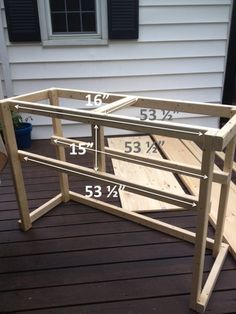 the measurements for an outdoor planter box are shown in front of a white house