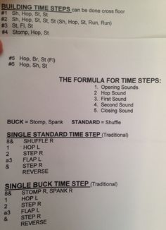 a hand holding up a paper with instructions for the formula for time steps on it