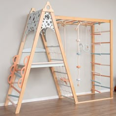 a child's room with a ladder and jewelry rack