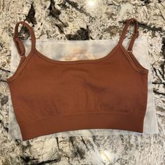 Oqq / Nwt / Crop Spaghetti Strap Top / Chocolate Color / Ribbed Material / Adjustable Straps / Padded Bra / Size Medium / #Oqq #Workout #Top Message Me Open To Negotiations Discounts On Bundles Brown Seamless Cami Tank Top, Trendy Seamless Brown Tank Top, Brown Spaghetti Strap Casual Camisole, Brown Spaghetti Strap Camisole, Brown Casual Camisole With Spaghetti Straps, Casual Brown Crop Top With Built-in Bra, Oqq Workout, American Eagle Crop Top, Boho Crop Tops