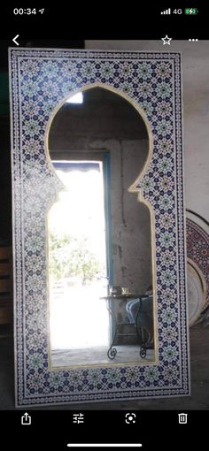 a mirror that is sitting on top of a table